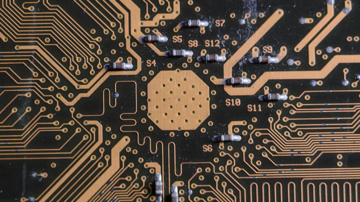 Close-up of a printed circuit board showing its electronic pathways and components
